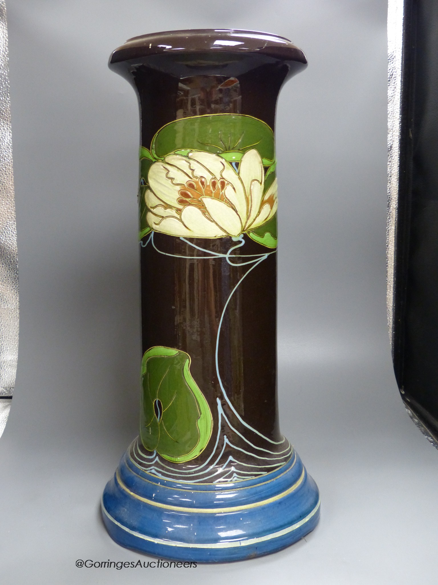 An Art Nouveau earthenware jardiniere, 53.5cm high